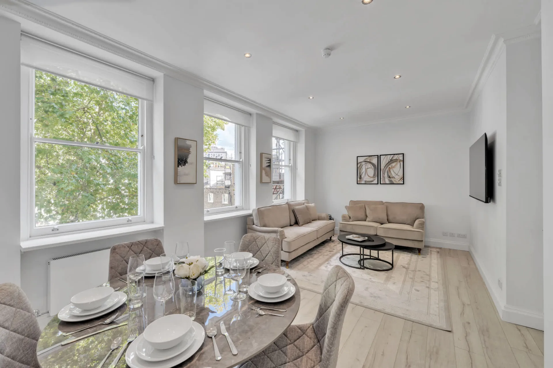 Luxury serviced apartment dining and living room in London